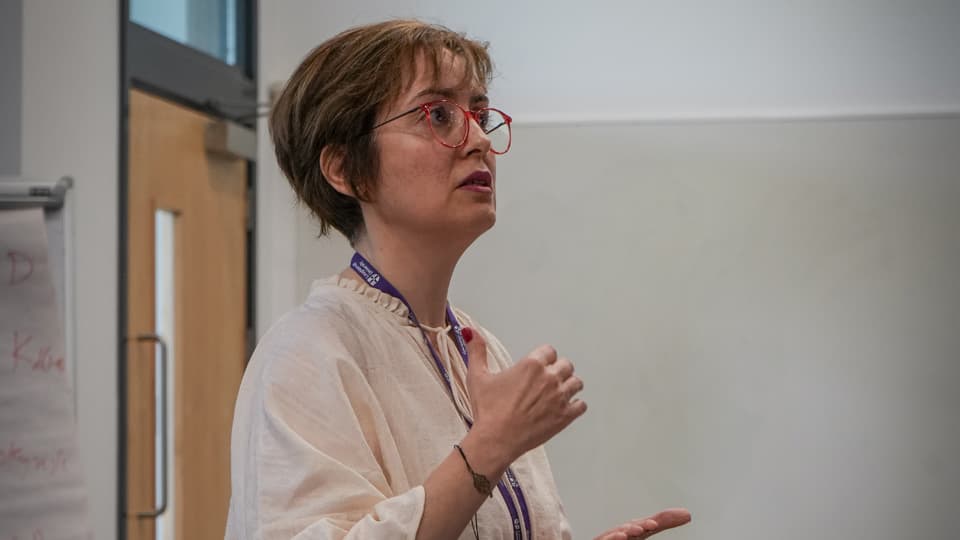 Professor Zeynep Aycan delivering a talk.